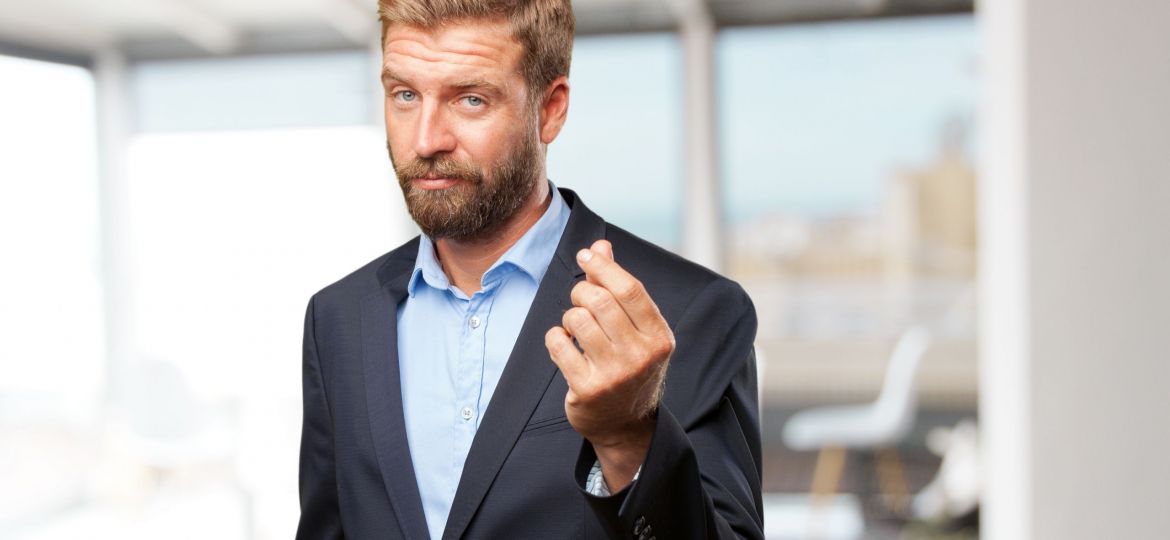 blond businessman happy expression